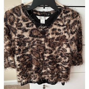 Includes cropped leopard print sweater & sleeveless light weight sweater top.